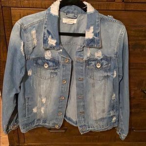 Woman’s Distressed denim jacket